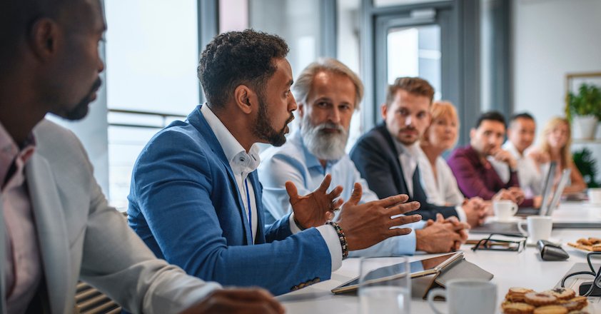 executive team listening to contrary views from colleague executive team listening to contrary views from colleague