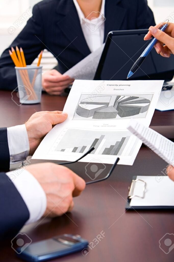 2861517 vertical image of people’s hands during discussion at business meeting 2861517 vertical image of people’s hands during discussion at business meeting